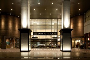 The exterior of Excel Hotel Tokyo with a modern design, featuring large pillars and a well-lit entrance. - Toyama Excel Hotel Tokyu (Toyama)