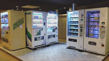 A row of vending machines in a public area.