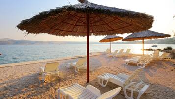 Private beach, sun loungers, beach umbrellas, scuba diving