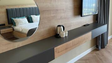 Deluxe Double Room | Minibar, in-room safe, individually decorated, desk