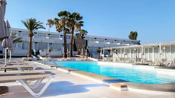 Outdoor pool, pool umbrellas, sun loungers