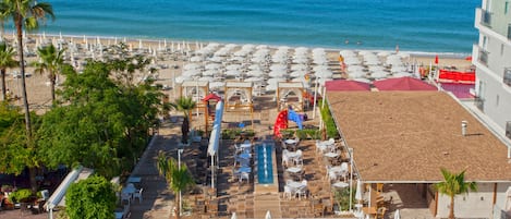 Private beach, free beach shuttle, sun loungers, beach umbrellas