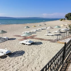 Private beach, free beach cabanas, beach shuttle, sun-loungers
