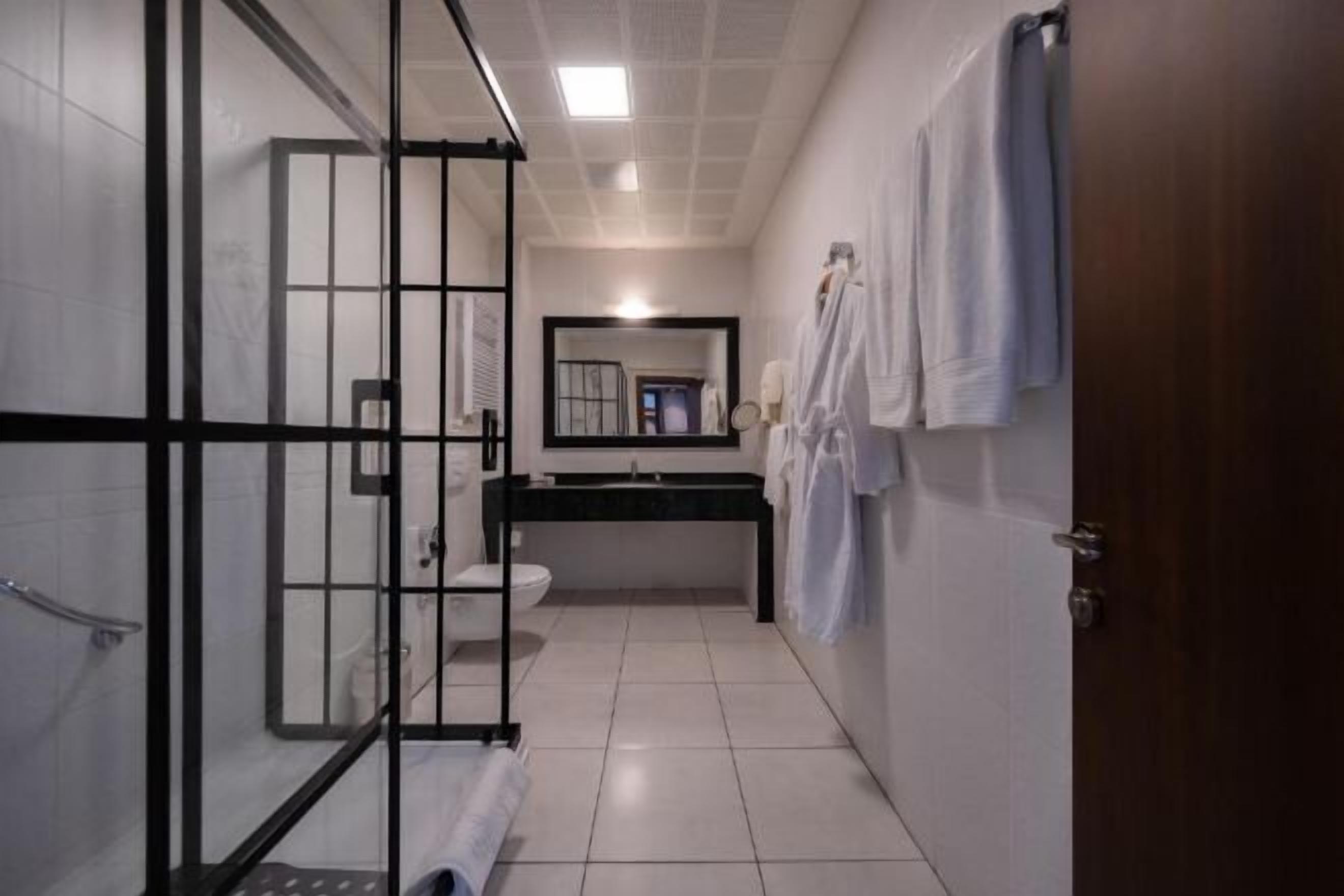 Bathroom | Free toiletries, hair dryer, slippers, towels