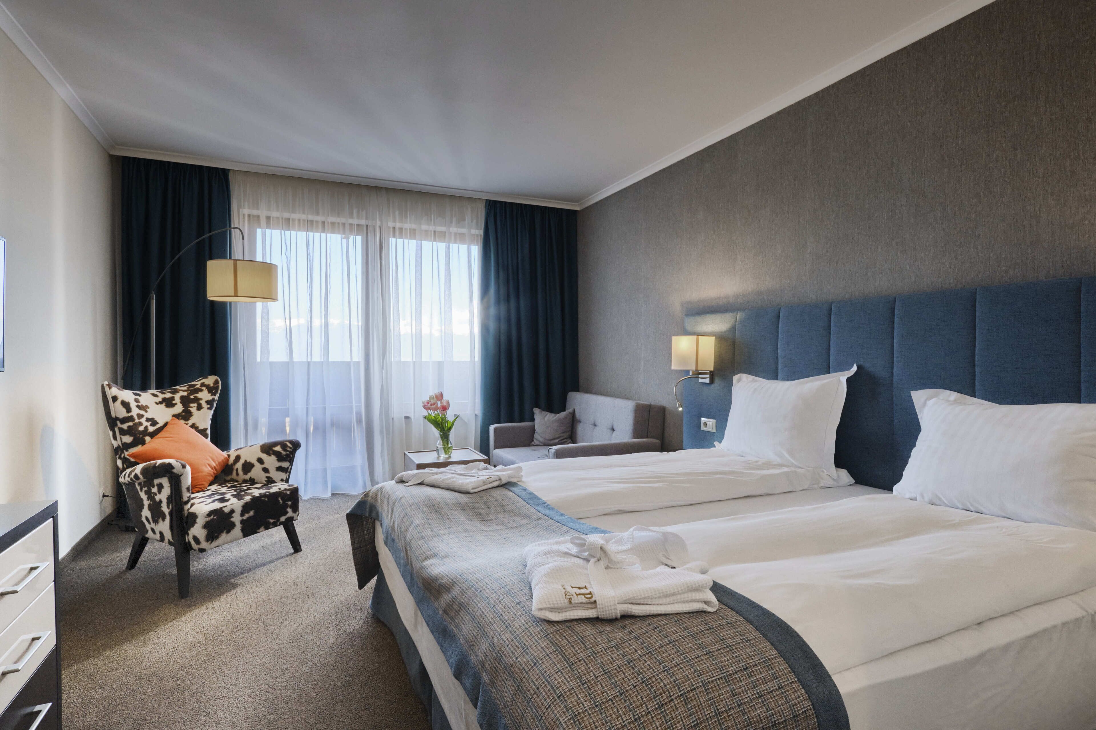 Standaard kamer, 1 twee- of 2 eenpersoonsbedden | Een bureau, gratis babybedden, gratis wifi, beddengoed