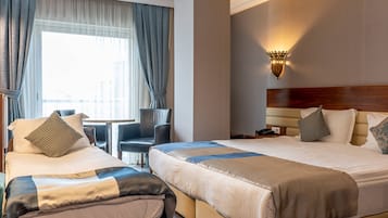 Standard Room, 1 Bedroom | Minibar, in-room safe, desk, blackout drapes