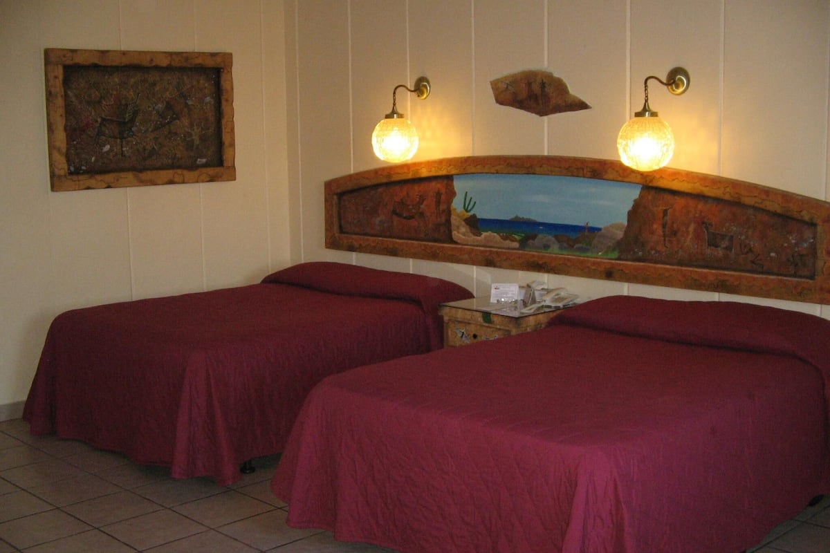 Pillow-top beds, in-room safe, iron/ironing board (on request)