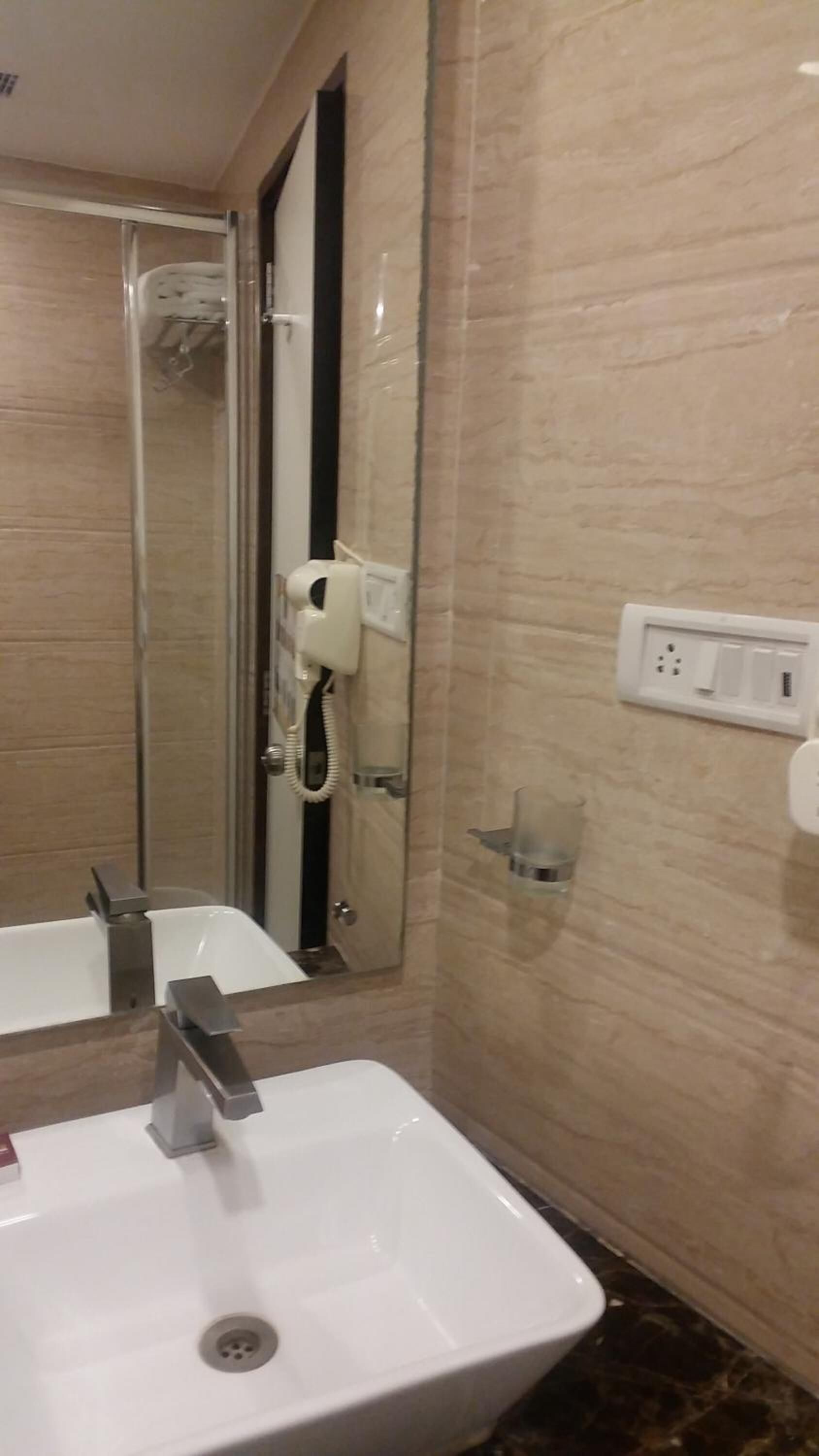 hair dryer, slippers, towels