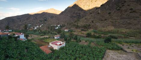 A mountainous landscape with a small village.
