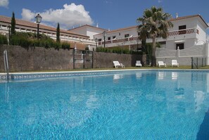 Outdoor pool, pool umbrellas, pool loungers