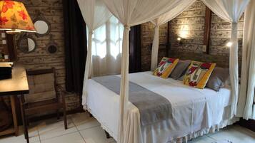 Bungalow Standar | Seprai katun Mesir, tempat tidur Select Comfort, minibar, dan brankas