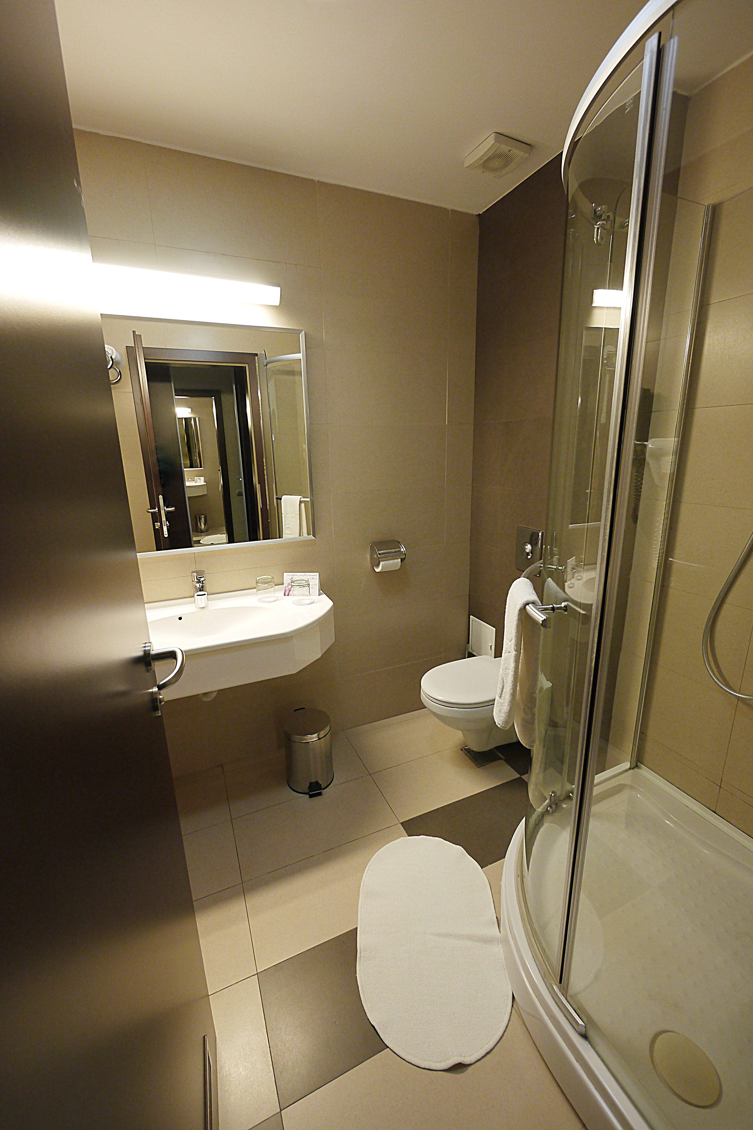 shower, rainfall showerhead, designer toiletries, hair dryer