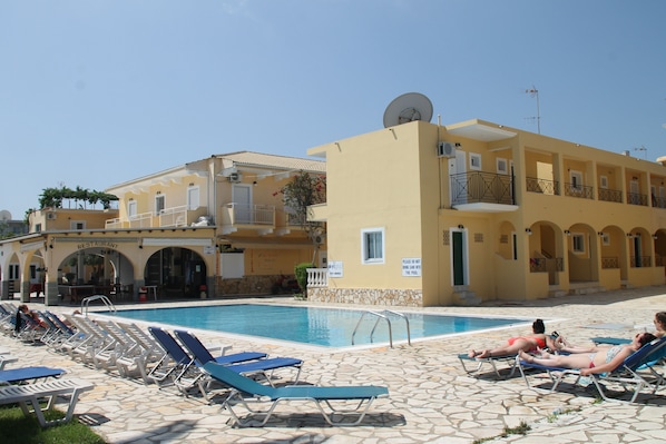 Indoor pool, outdoor pool, pool umbrellas