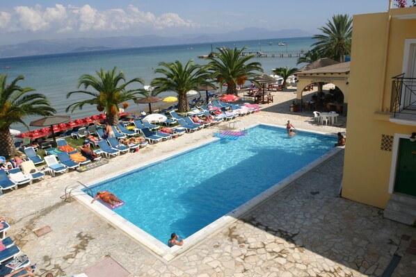 Indoor pool, outdoor pool, pool umbrellas
