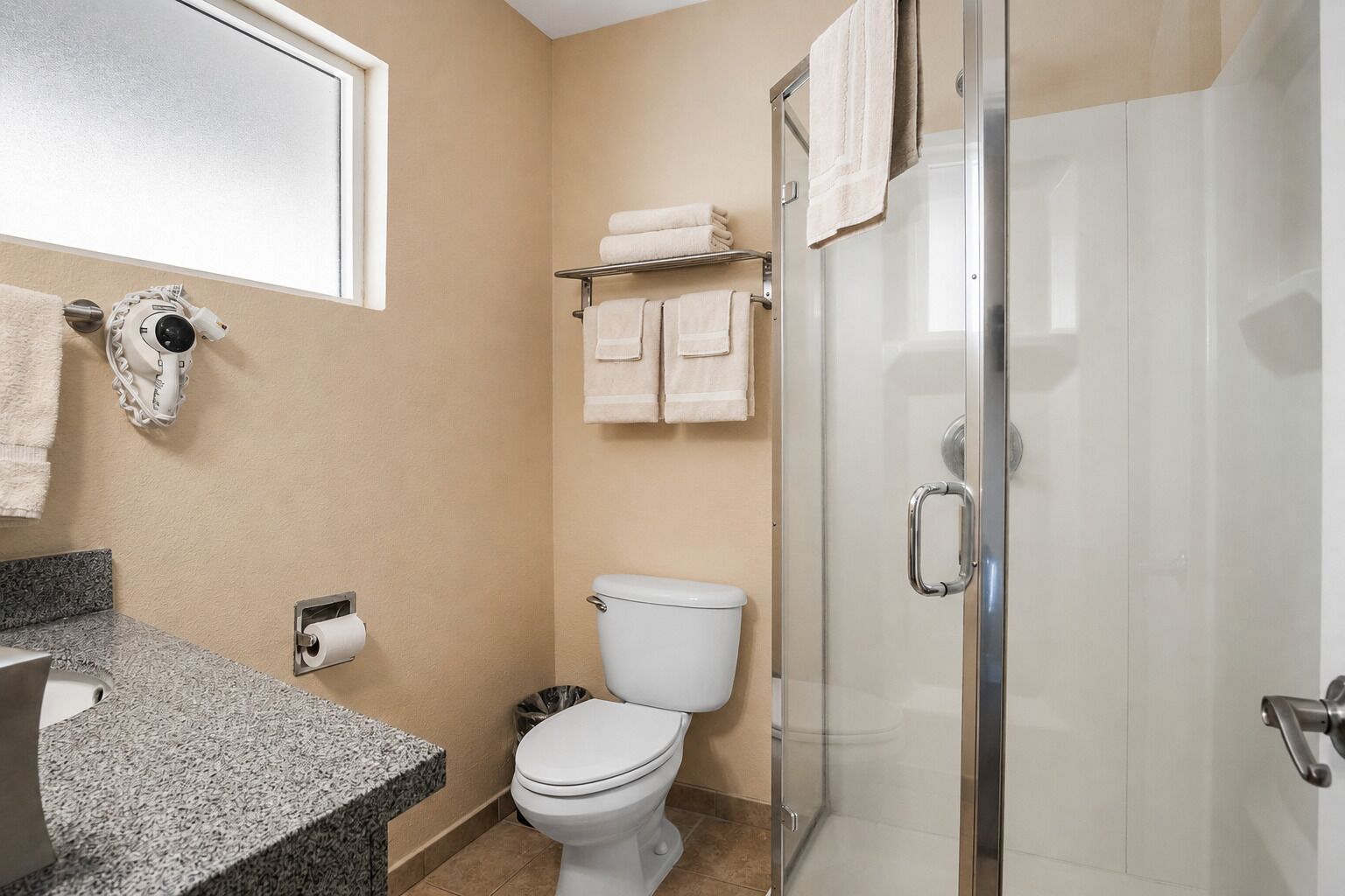 Hair dryer, slippers, towels