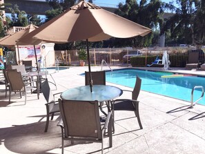 Outdoor pool, pool umbrellas, pool loungers