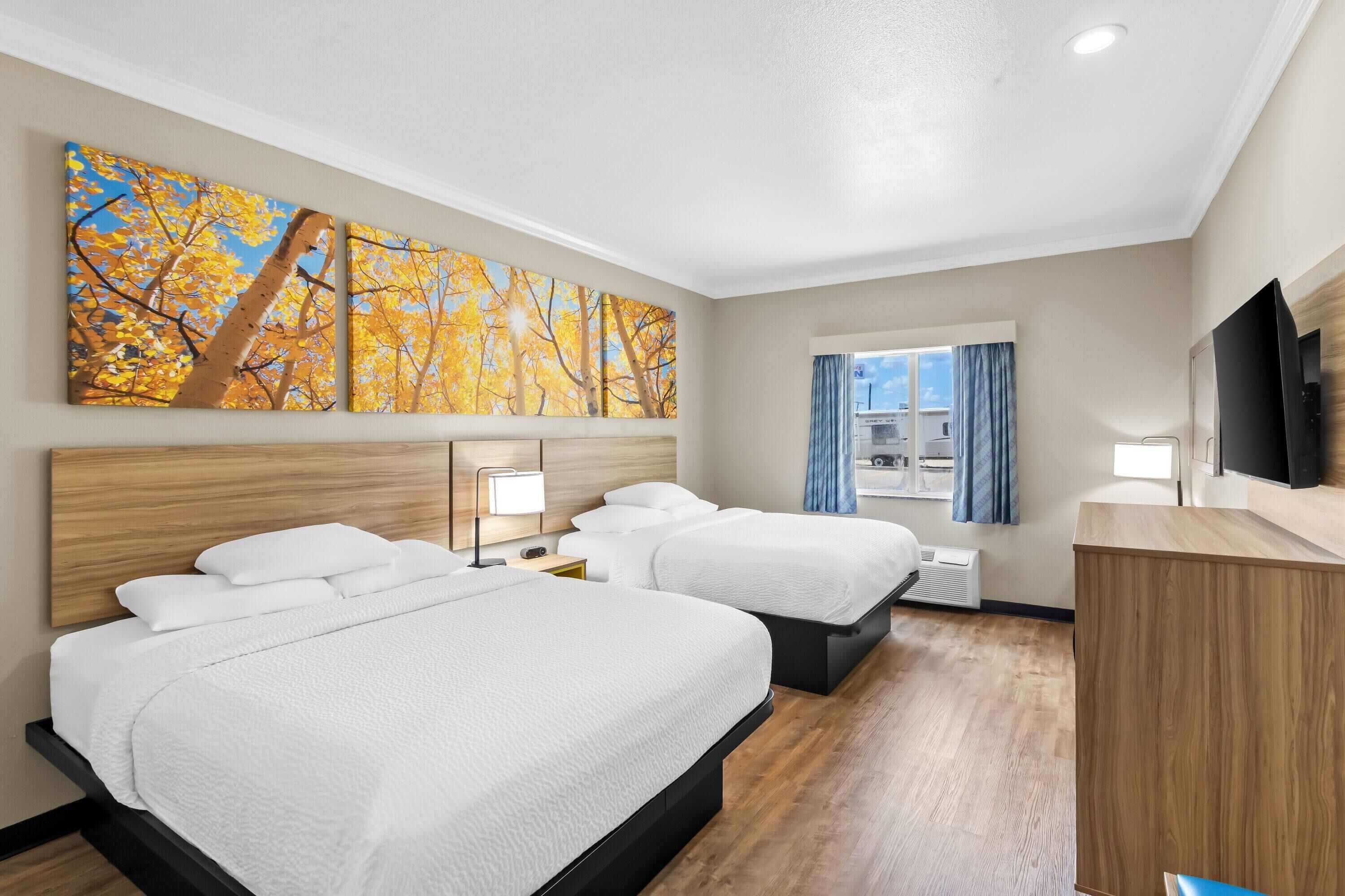 Standard-huone, 2 keskisuurta parisänkyä | Työpöytä, silitysrauta/-lauta, ilmainen Wi-Fi, vuodevaatteet