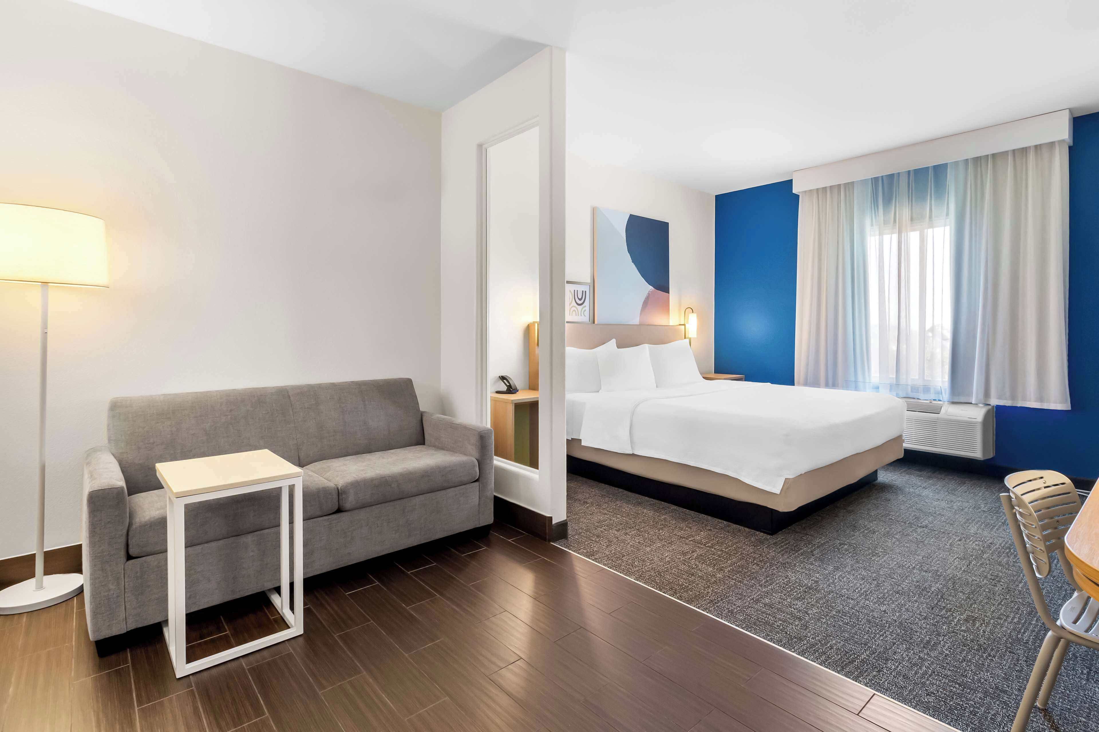 room, 1 king bed with sofa bed | living area | 50-inch flat-screen tv with satellite channels, tv