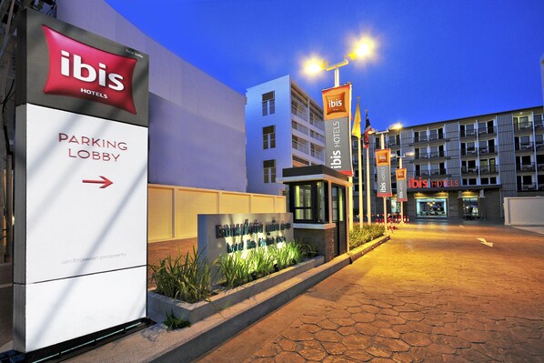A hotel entrance with signage for "ibis Hotels" and "Parking Lobby." - ibis Phuket Kata (Karon)