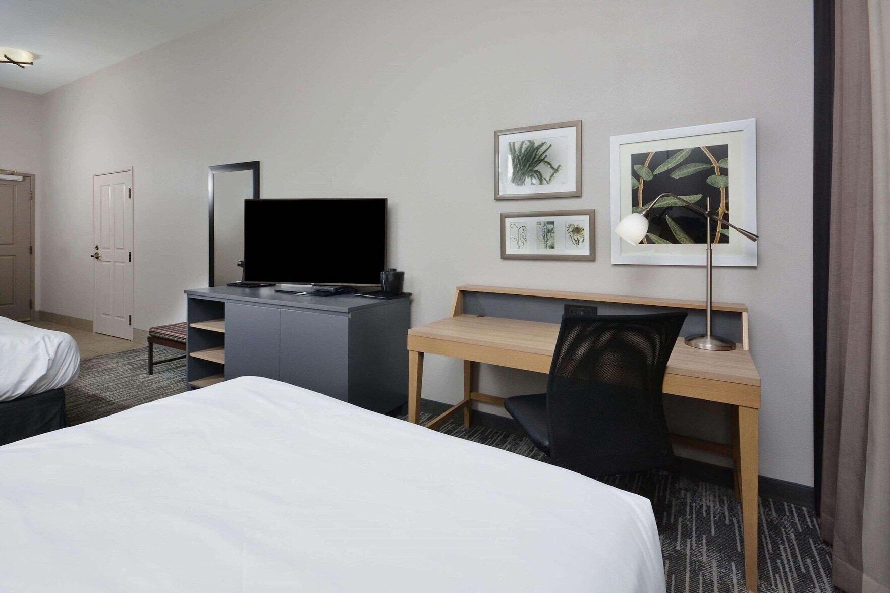 Desk, laptop workspace, blackout drapes, iron/ironing board