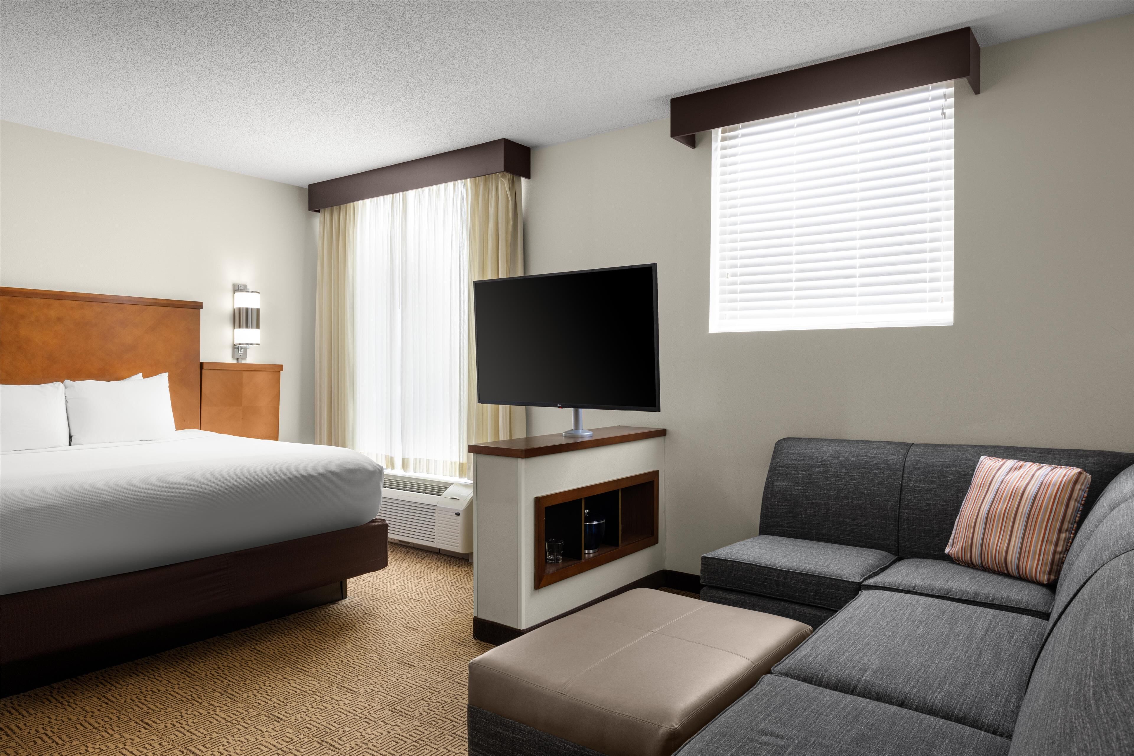 down duvets, pillow-top beds, desk, blackout curtains