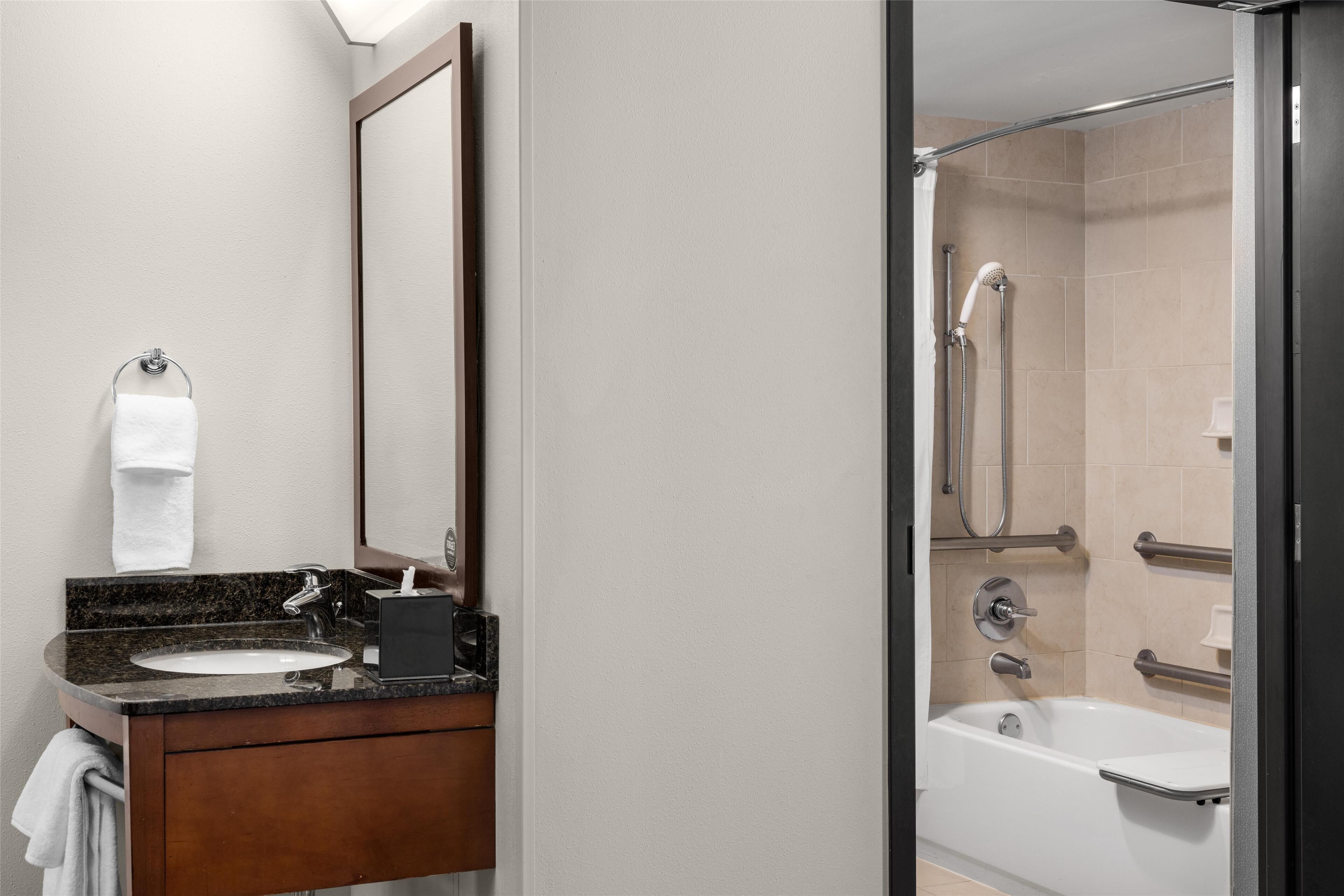 room, 1 king bed, accessible, bathtub | bathroom | designer toiletries, hair dryer, towels
