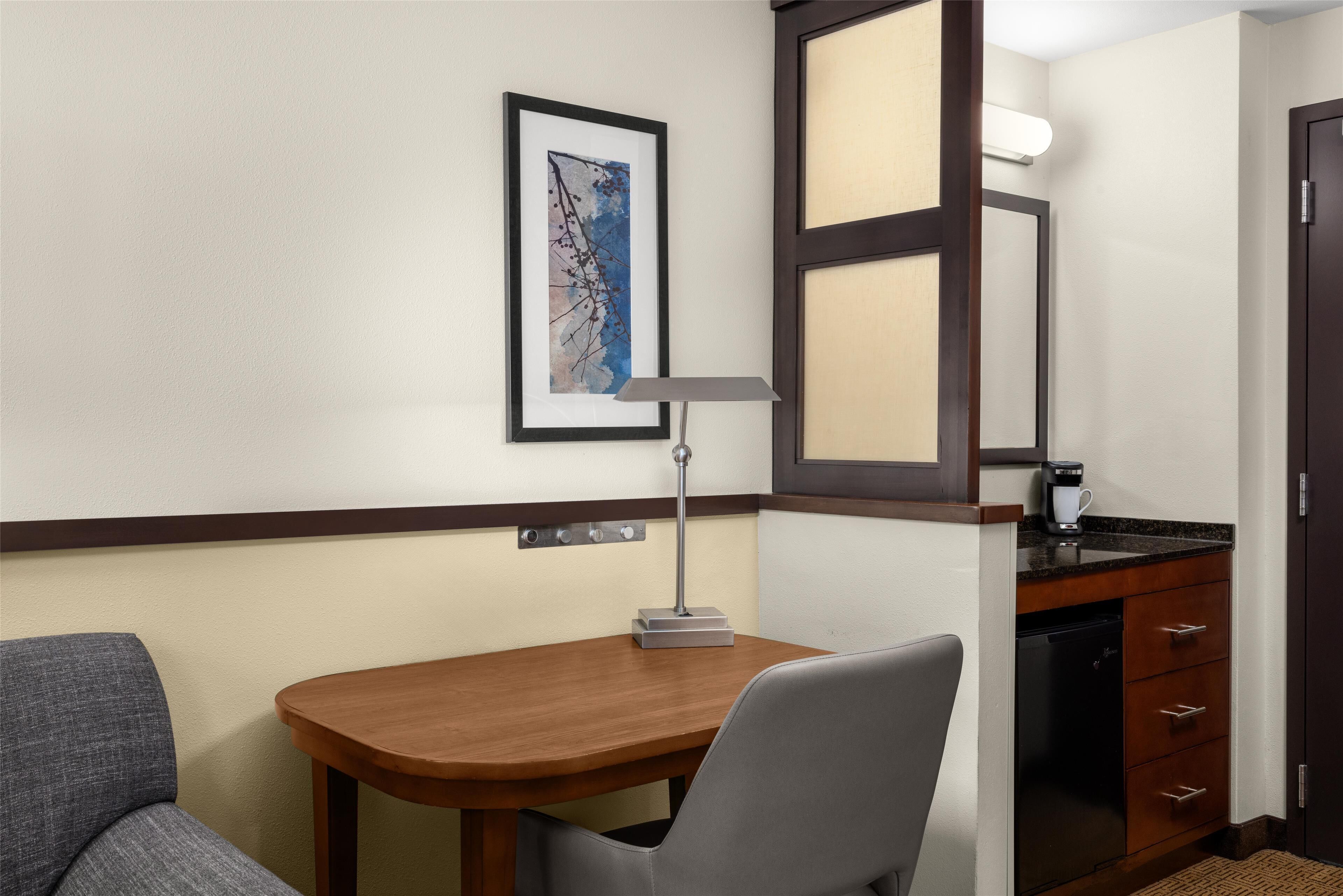 down duvets, pillow-top beds, desk, blackout curtains