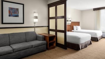 Down comforters, pillowtop beds, desk, blackout drapes
