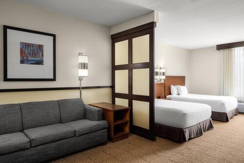 Down comforters, pillowtop beds, desk, blackout drapes