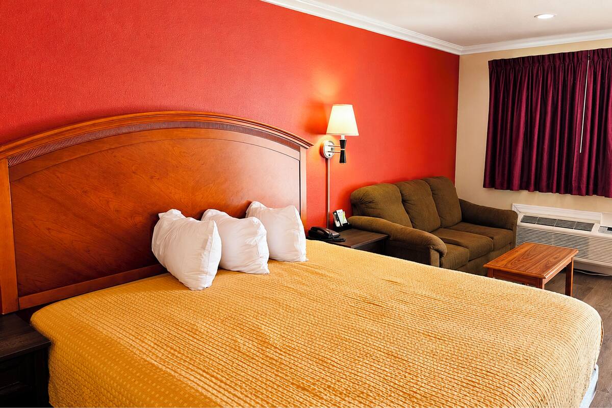 Premium bedding, pillow-top beds, blackout curtains, iron/ironing board