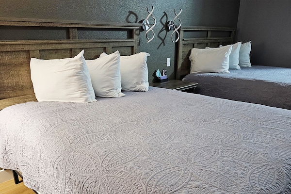 Premium bedding, pillowtop beds, blackout drapes, iron/ironing board