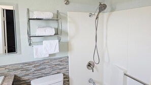 Deluxe Room, 1 King Bed, Non Smoking, Refrigerator & Microwave | Bathroom | Combined shower/tub, hydromassage showerhead, eco-friendly toiletries - Magnuson Hotel Blythe (Blythe)