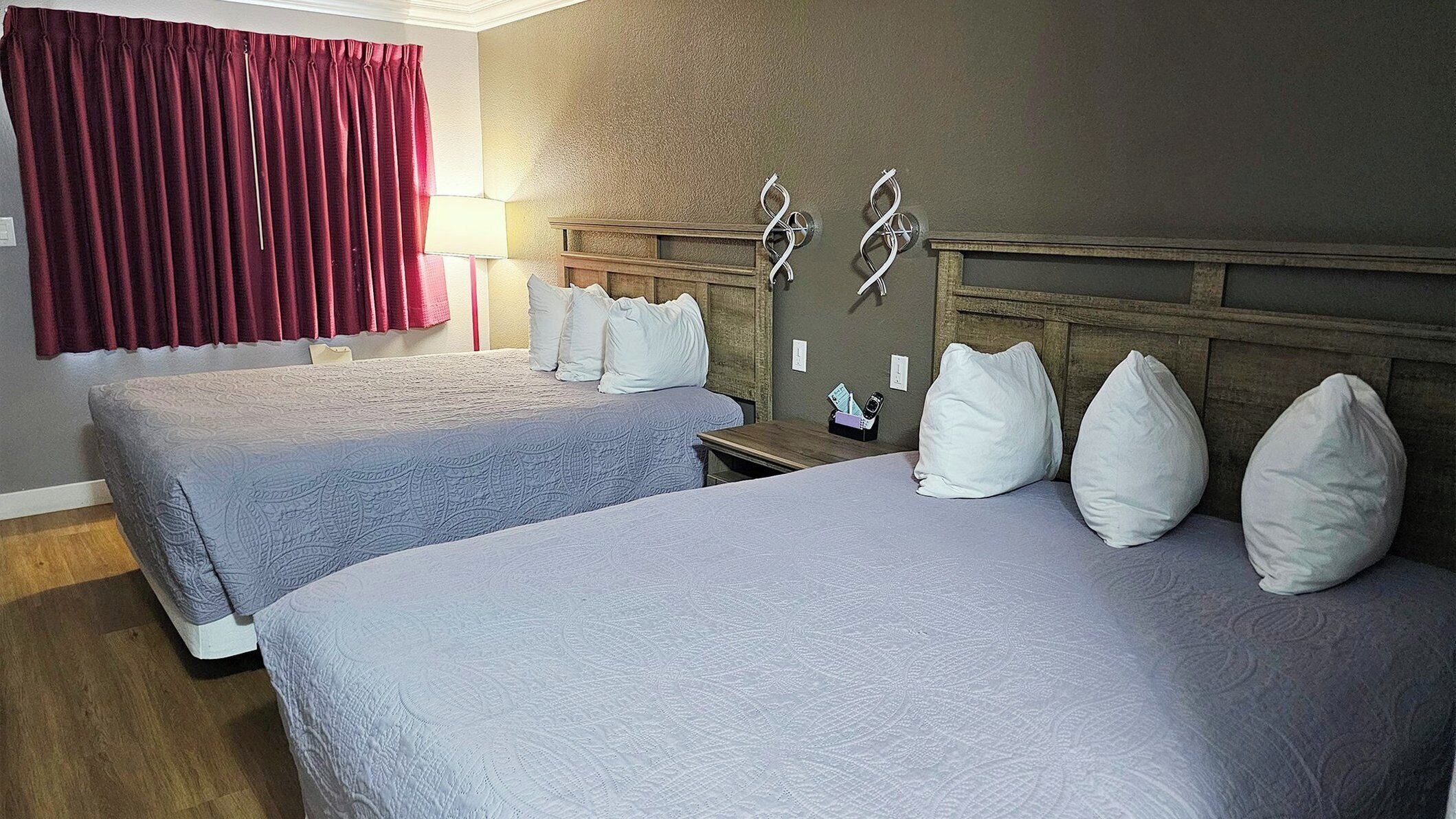 Premium bedding, pillowtop beds, blackout drapes, iron/ironing board