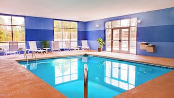 Indoor pool, open 7:00 AM to 9:00 PM, pool umbrellas, pool loungers