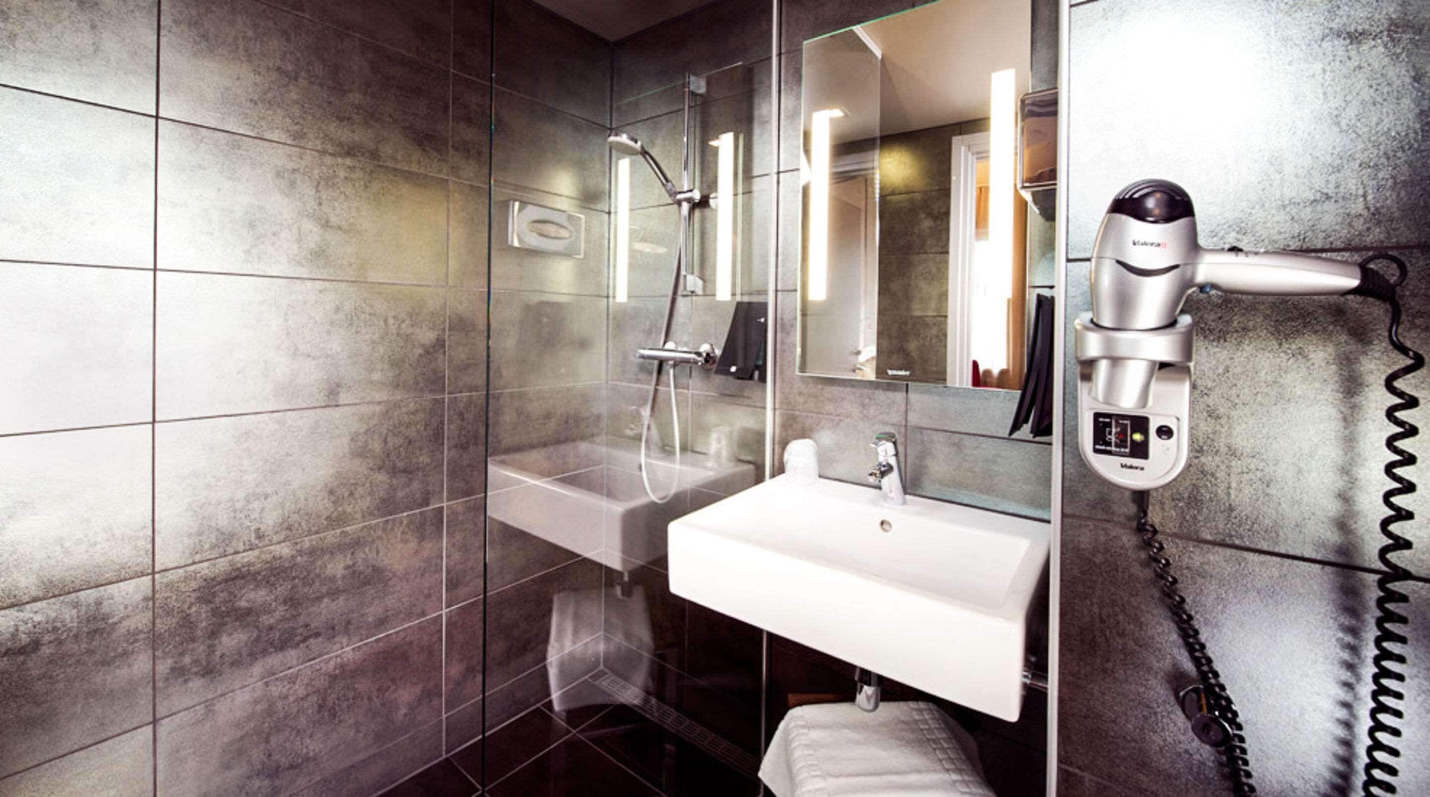 single room (compact) | bathroom | hair dryer, towels, soap, shampoo