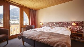 Hypo-allergenic bedding, pillow-top beds, in-room safe, desk
