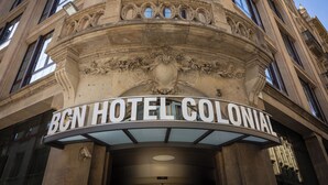 The exterior of the BCN Hotel Colonial with its classic architecture and prominent signage.