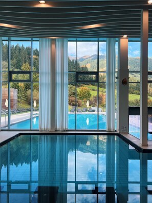 Indoor pool, 2 outdoor pools, open 8:00 AM to 9:00 PM, pool umbrellas - Kempinski Hotel Das Tirol (Jochberg)
