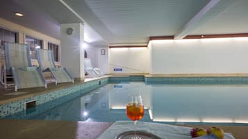 Indoor pool, pool umbrellas, sun loungers