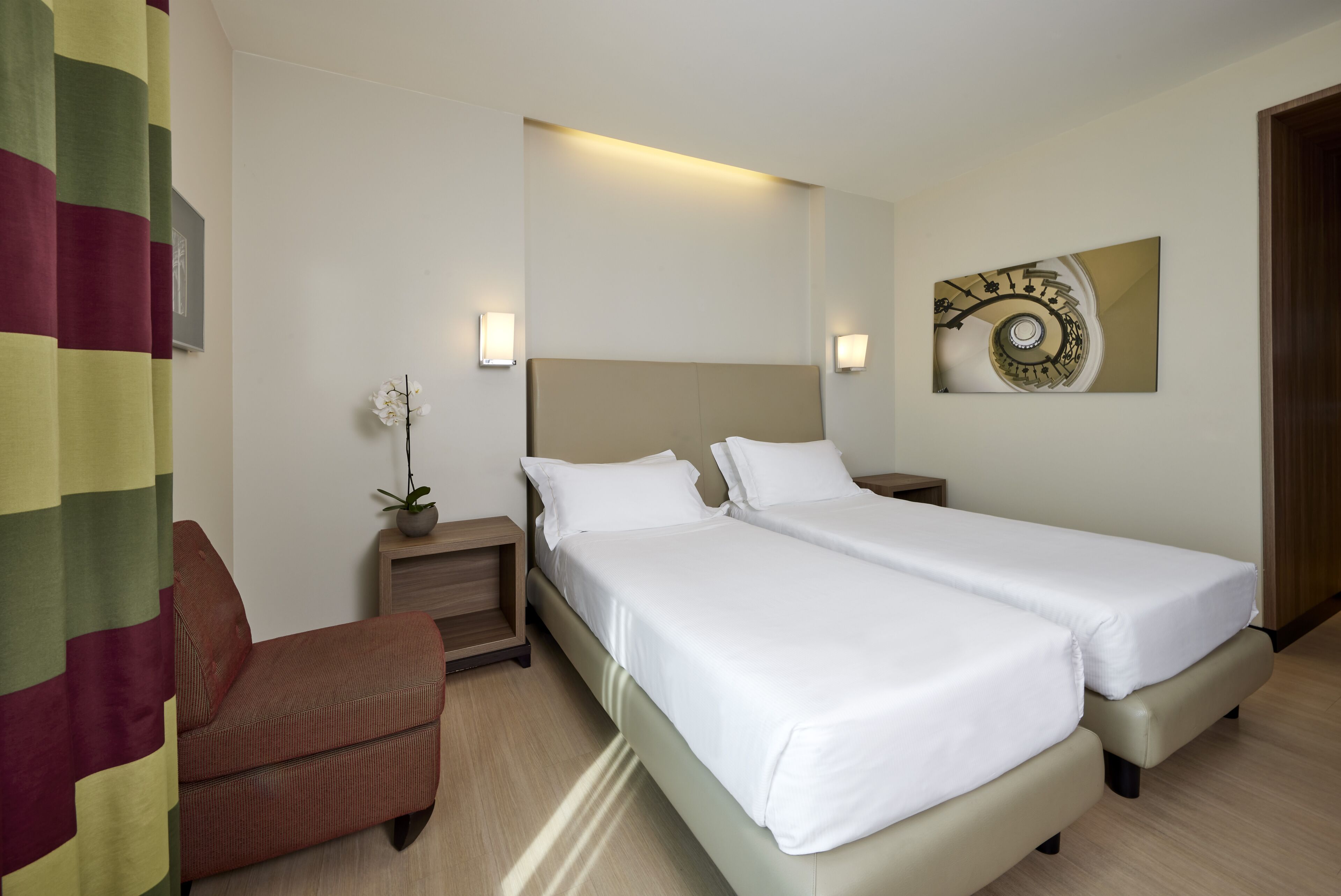 twin room | minibar, in-room safe, desk, blackout curtains