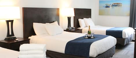 Triple Room (3 Queen Beds) | Desk, iron/ironing board, free WiFi, bed sheets