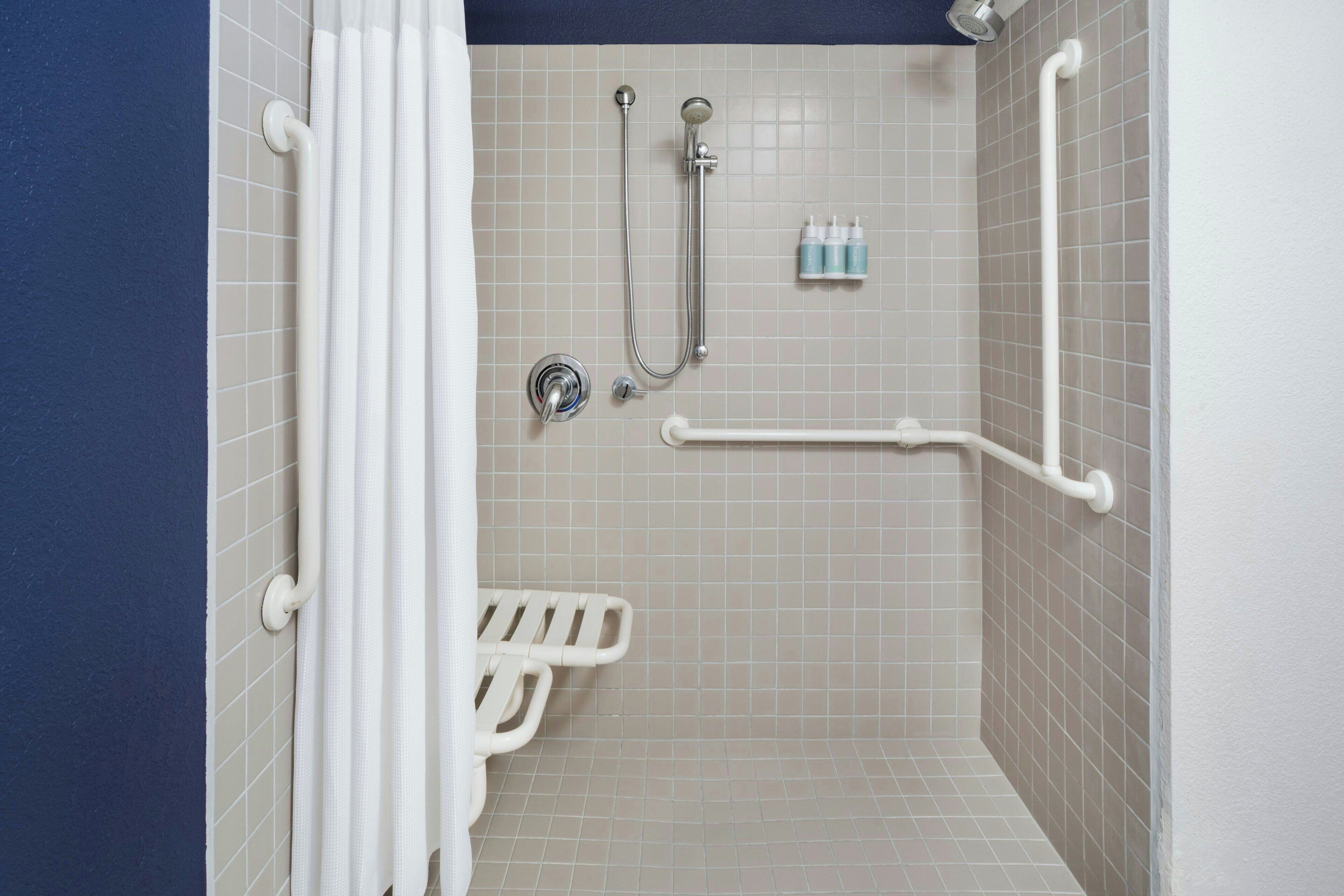 combined shower/bathtub, free toiletries, hair dryer, towels