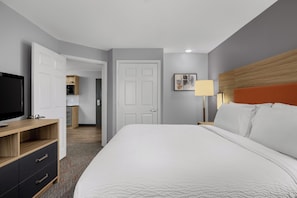 Suite, 1 Bedroom | Desk, blackout drapes, iron/ironing board, free WiFi