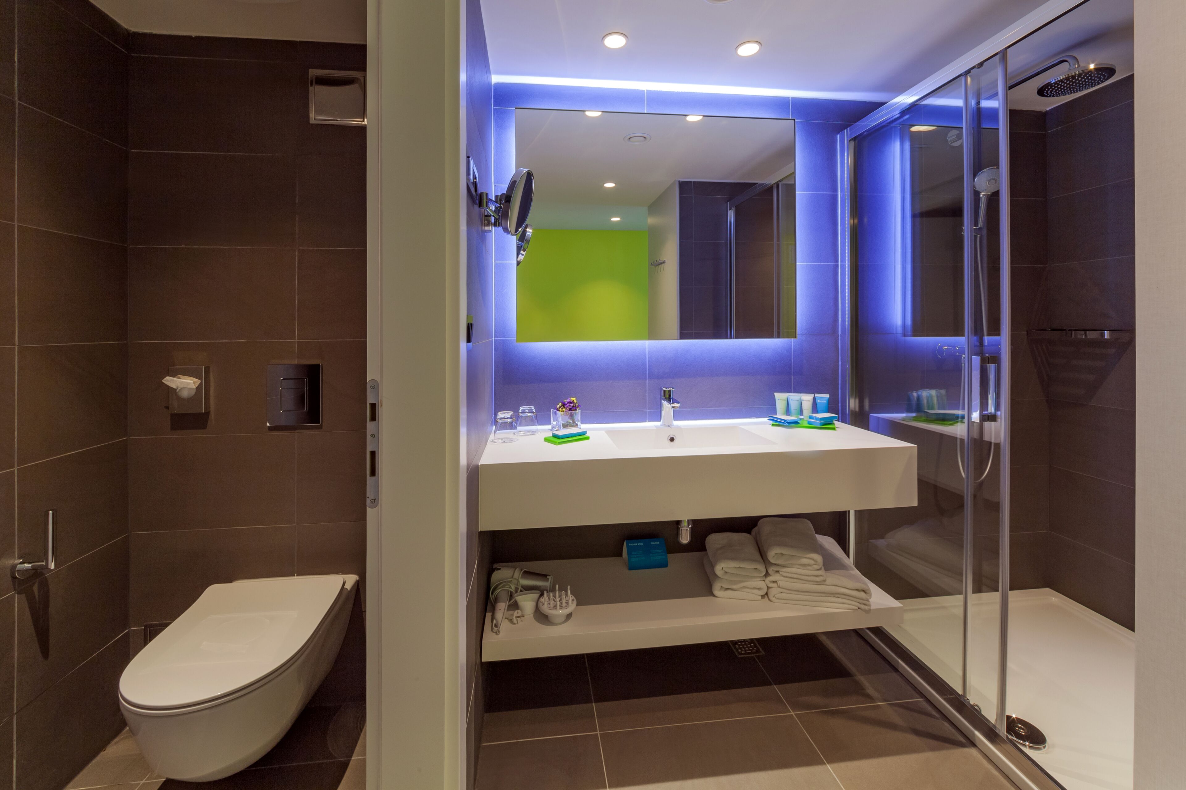 shower, free toiletries, hair dryer, towels