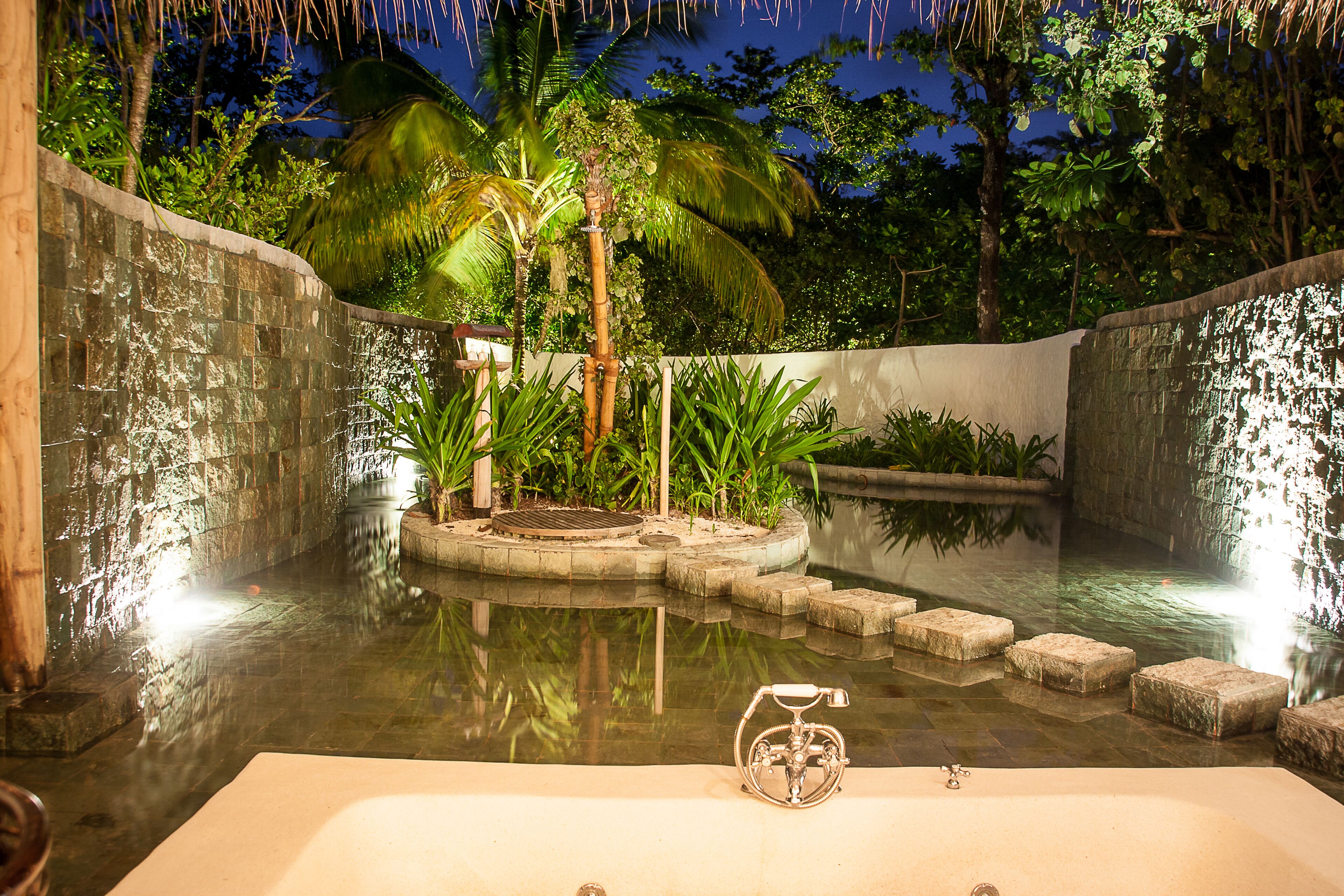 Soneva Fushi Family Villa Suite with Pool | Bathroom | Separate tub and shower, jetted tub, rainfall showerhead