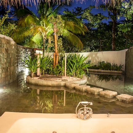 Soneva Fushi Family Villa Suite with Pool | Bathroom | Separate tub and shower, jetted tub, rainfall showerhead