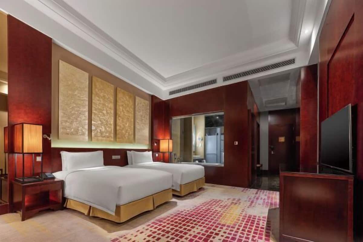 Premium bedding, down duvets, memory-foam beds, minibar
