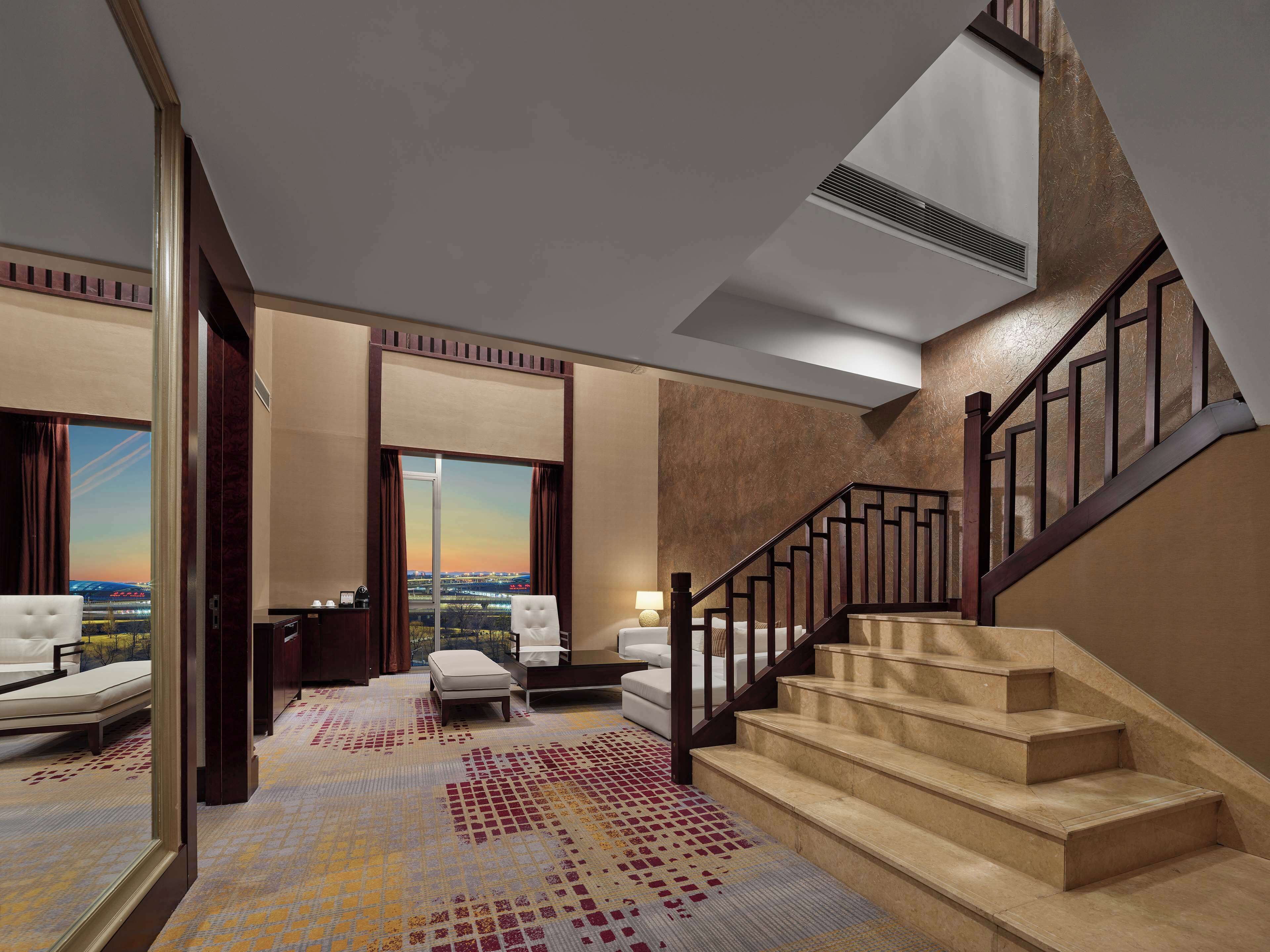 two bedrooms duplex suite | living area | lcd tv