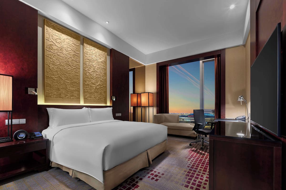 two bedrooms duplex suite | living area | lcd tv