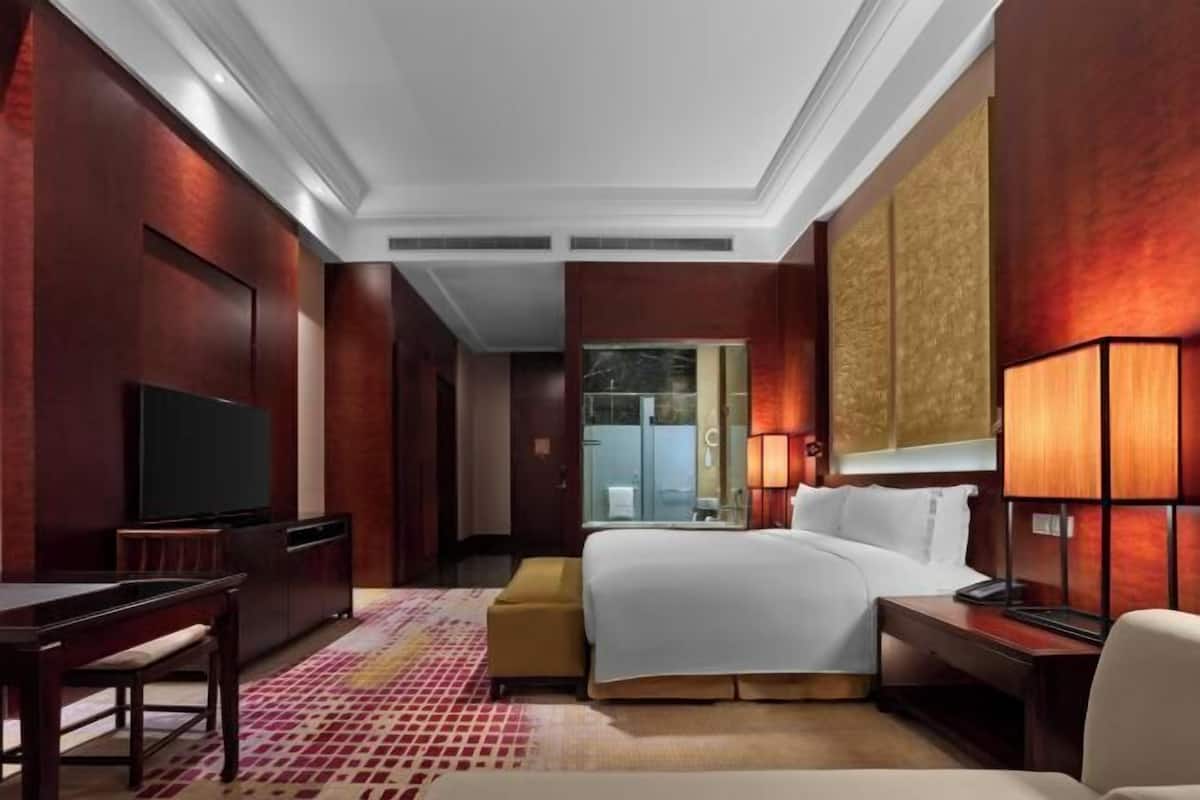 Premium bedding, down duvets, memory-foam beds, minibar
